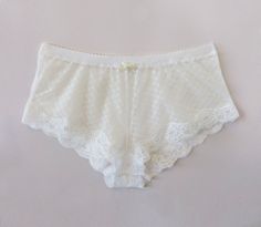 Panties Size: Medium White Lace String Bottoms, Cream Lace Trim Briefs, Wedding Bottoms With Lace Trim String Shape, Cream Lace Brief Bottoms, Sheer White Bottoms For Wedding, White Sheer Bottoms For Wedding, Elegant White Sheer Bottoms, Sheer White Wedding Bottoms, Sheer Lace Bottoms For Wedding