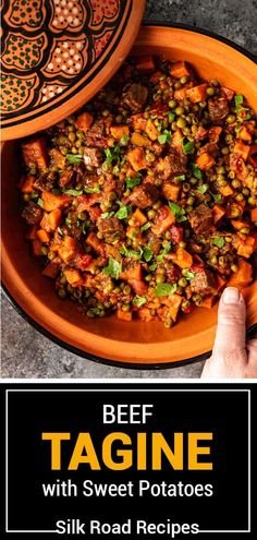 beef tagine with sweet potatoes and silk road recipes in a bowl on top of a table