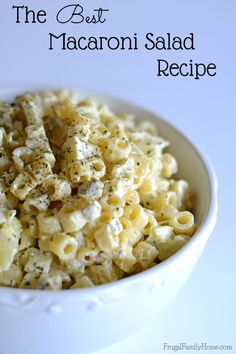 the best macaroni salad recipe in a white bowl on a table with text overlay