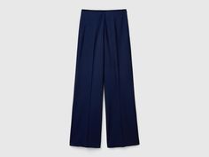 Long trousers with a high waist in a flowy stretch viscose blend fabric. Wide leg and flared at the bottom, hidden zip opening on one side. Refined and everyday, perfect even at the office. Dungaree Skirt, Jumpsuit Skirt, Long Trousers, High Waisted Trousers, Blouse Dress, Women Collection, The Office, Top Shirt, Knitwear