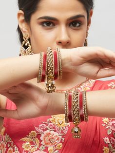 These fancy stone bangles are a perfect accessory for any of your Indian outfits Traditional Indian Jewelry:Slight Color variations are possible due to lighting and photography. If you are interested in purchasing this item and have any additional questions about this item, please feel free to email us at nazranaanj@gmail.com. For faster responses, call us at 732-283-1808 or WhatsApp us at 609-852-9922 Care instructionsKeep Jewelry away from direct heat, water, perfumes, deodorants and other str Bangle For Diwali Celebration, Bangle Jewelry For Navratri Celebration, Hand Set Bangle For Festivals, Temple Jewelry Bracelets With Stone Work For Party, Adjustable Jewelry With Gota Work For Festive Occasions, Adjustable Gota Work Jewelry For Festive Occasions, Party Jewelry With Gota Work, Traditional Party Bracelets With Latkans, Traditional Latkans Bracelets For Party