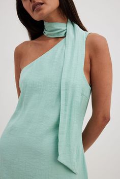 This mini dress features a one shoulder design. It has a scarf detail and a zipper. This mini dress features a lining. Mini Dress Blue, Future Fashion, Neck Wrap, Shoulder Design, Dress Blue, Industrial Style, Women Empowerment, Blue Dresses, One Shoulder