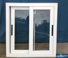 an image of a white double doors with glass on the front and side windows that are closed