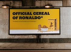 a billboard advertises cereal and coffee on the side of a train station platform