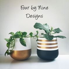 two vases with plants in them sitting on a white table next to the words four by nine designs