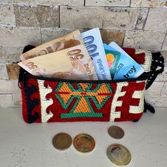 Designed to carry coins, the boho coin purse is a mix of different colors and rug motifs. Boho wallet allows you to experience a historical feeling by combining Turkey's kilim models with its past. It won't bother you with its flexible fabric. We produce beautiful wallets for you and your loved ones. A unique gift for your loved ones on their special day. You can give it as a birthday gift, Christmas gift, Our specially produced wallets are handmade. (DOES NOT CONTAIN CANCEROGENS) Dimensions: Le Bohemian Woven Pouch For Gift, Handmade Red Coin Purse For Travel, Daily Use Bohemian Coin Purse, Bohemian Handmade Coin Purse For Travel, Handmade Bohemian Coin Purse For Travel, Bohemian Handmade Travel Coin Purse, Traditional Pouch Coin Purse For Everyday Use, Handmade Tapestry Bag For Gift, Traditional Everyday Coin Purse Pouch