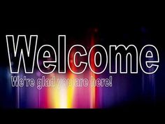 the words welcome are lit up against a black background