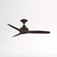 a ceiling fan that is in the air