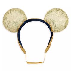 a gold and blue headband with sequins in the shape of mickey ears