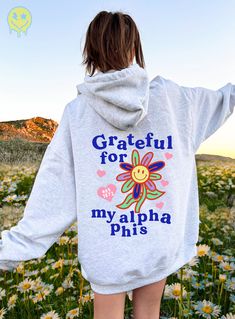 Soft, cute, and trendy, this Alpha Phi hoodie will quickly become your go-to cozy sweatshirt! Use the drop down to specify preference between white, ash, gold, irish green, light blue, carolina blue, or light pink. LISTING IS FOR ALPHA PHI. Please be sure you are ordering for your correct Sorority.  We print on high quality, soft, & heavyweight materials, sustainably made and printed in the US. ♥ SIZING ♥ Unisex Sizing- For a more feminine, fitted look we recommend getting your size. For a more oversized look, we recommend sizing up. ♥ SHIP TIME ♥ Items may take up to 7 business days to process before shipping. Shipping time is (on average) an ADDITIONAL 2-5 business days. Shipping times vary for many reasons, but is largely influenced by your location. ♥ CARE INSTRUCTIONS ♥ Wash garments Alpha Epsilon Phi, Big Gift, Sorority Sweatshirts, Alpha Sigma Tau, Phi Sigma Sigma, Alpha Xi Delta, Alpha Gamma Delta, Alpha Sigma Alpha, Sweatshirt Trendy