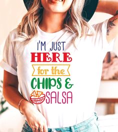 This "I'm Just Here For The Chips & Salsa" design is the perfect, fun Cinco De Mayo shirt for anyone that loves drinks and to celebrate! Funny Multicolor Top With Text, Multicolor Funny Tops With Text, Fun Multicolor Tops With Funny Text, White Graphic Print Tops For Cinco De Mayo, White Letter Print Tops For Cinco De Mayo, Multicolor Tops With Funny Text, Multicolor Letter Print Tops For Cinco De Mayo, Cinco De Mayo Funny Print Crew Neck Top, Fun Graphic Print T-shirt For Cinco De Mayo