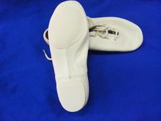 Theatricals J002W Adult Size 3.5M White Lace Up Jazz Shoe Split-sole design hugs the arch to enhance the line and to give ultimate flexibility. Manufactured on a new last for superb fit. Newly-developed leather is lightweight and flexible with a soft hand and a rich appearance. Eva sole and heel are engineered to provide traction without inhibiting turns. Suede leather sock lining designed for flexibility and control while the cotton lining absorbs perspiration. View more great items Fitted Dance Shoes For Spring, Fitted Lace-up Dance Shoes With Rubber Sole, Fitted Spring Dance Shoes, Fitted Non-slip Dance Shoes With Round Toe, Non-slip Fitted Dance Shoes With Round Toe, Classic Fitted Dance Shoes, Fitted Dance Shoes With Rubber Sole For Practice, Fitted Ballet Dance Shoes For Spring, Dance Shoes Jazz