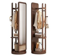 two wooden shelves with mirrors and clothes hanging on the wall next to eachother