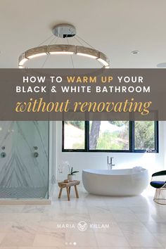 a white bathroom with the words how to warm up your black and white bathroom without renovating