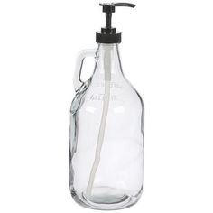 a glass soap dispenser with a black pump