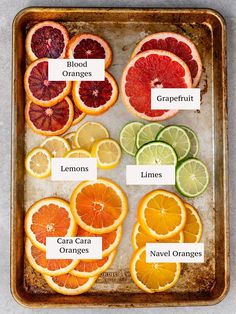 an image of blood oranges and lemons on a baking sheet with labels labeled