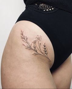 a woman's thigh with flowers on it and the words, follow