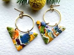 "Looking for a unique piece of jewellery to make a bold statement? Look no further than these striking Orange, Blue and Green Marble Drop Earrings!  These unique handmade earrings are carefully handcrafted using watercolour technique , being hand painted with heavy body acrylic paints . They have gold plated stainless steel post studs and findings (for sensitive skin). Whether you're buying them as a birthday gift for your best friend, or as a treat for yourself, these earrings are sure to turn heads. So why wait? Add them to your cart today and make a statement with your style! They are modern and one of a kind. Very lightweight & comfortable  and easy to wear. They are available in different unique styles ; measurements at widest & longest point: * V shape  : 5.8cm long x 4.0cm wide * di Blue Triangle Earrings For Gift, Artsy Blue Jewelry For Party, Artsy Blue Earrings For Party, Artistic Blue Party Earrings, Unique Blue Hoop Earrings For Gift, Unique Blue Hoop Earrings As Gift, Unique Triangle Earrings As A Gift, Unique Handmade Triangle Earrings, Birthday Gift For Best Friend