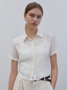 Editor's notesTRIP LE SENS' stylish and trendy cropped-length shirt is made of pleats fabric with a breathable and comfy fitting.- Button closure- Regular collar- Pleats fabric- Cropped length- Breathable and comfy fabricMeasurements(in.)S/M- Length: 18.89 / 19.29 in.- Shoulder: 14.96 / 15.74 in.- Chest: 18.11 / 18.89 in.- Sleeve: 7.08 / 7.48 in.Model infoMan - 6'03 Fitting size LWoman - 5'64 Fitting size MComposition & Care- 80% Polyester, 20% Nylon- Dry cleaning- Do not tumble dry- Do not bleach- Iron at low temperature with clothDesigner- by TRIP LE SENS Versatile Summer Blouse With Collared Neckline, Versatile Collared Blouse For Summer, Chic Fitted Cropped Shirt With Collar, Classic Cropped Summer Shirt, Fitted Cropped Shirt For Day Out, Chic Fitted Cropped Shirt With Short Sleeves, Classic Collared Cropped Shirt For Summer, Chic Collared Crop Top For Summer, Chic Fitted Short Sleeve Cropped Shirt