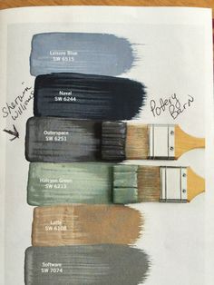 an open book with some paint colors on it