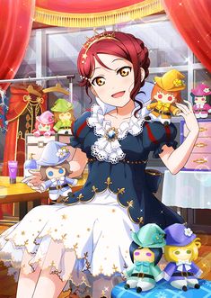 an anime character with red hair sitting on a bed next to stuffed animals and other toys