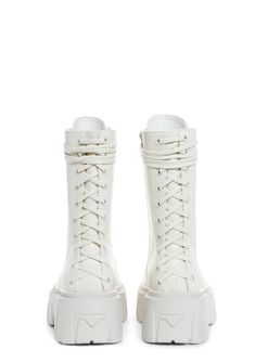 give 'em a taste of your magic, babe! These combat boots have corset lace-up details on the front and back, chunky platform soles, and side zip closures. White Chunky Boots, Corset Boots, Rave Boots, White Combat Boots, Goth Shoes, Fairy Dresses, Lace Up Combat Boots, Pride Outfit, Corset Lace