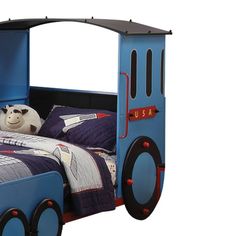 a child's bed made to look like a train car