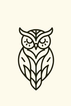 an owl with big eyes sitting on top of a tree branch