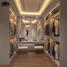 a large walk in closet with white walls and wooden flooring, lighted by recessed lighting