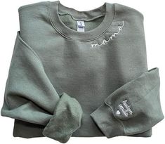 [Introduction] This classic crewneck sweatshirt features ribbing on the collar, hem, and cuffs to keep you warm. Double-needle stitched neckline, bottom hem, and sleeves shirt. Package includes 1 sweatshirt. [Gift perfect] Looking for the perfect sweater for your loved ones? Look no further! This awesome Custom Sweatshirt is a comfortable, affordable way to express yourself. Whether purchasing for anyone you can be sure to put a smile on their face [Customization] You can easily make your own sh Mama Pullover, Mama Embroidered Sweatshirt, Dog Mom Sweatshirt, Cheap Sweatshirts, Kids Names, Mama Sweatshirt, Christmas Mom, Embroidered Sweater