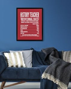 a living room with blue walls and a black framed poster on the wall that says history teacher nutritional effects