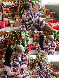 two people hugging each other in front of a christmas tree