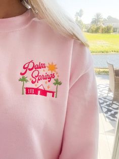 Spring Long Sleeve Tops With Embroidered Logo, Long Sleeve Tops With Embroidered Logo For Spring, Trendy Embroidered Logo Tops For Loungewear, Cute Embroidered Spring Tops, Cute Embroidered Tops For Spring, Cute Long Sleeve T-shirt With Embroidered Text, Pink Crew Neck Top With Embroidered Logo, Trendy Tops With Custom Embroidery For Fall, Pink Sweatshirt With Embroidered Logo For Spring