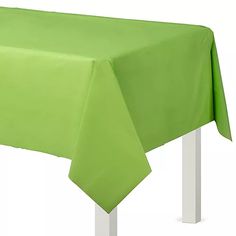 a green table cloth with white legs