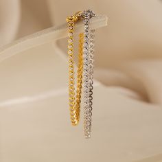 Your wedding day is a time for you to sparkle and be the center of attention. Accentuate your romantic ensemble with our Diamond Bezel Tennis Bracelet. Available in 3 lengths, this minimalist gemstone bracelet can be chosen based on the fit you need, making it an even more personalized bridal gift. Finish/Material: 18K Gold Over Brass ∙ Rhodium Over Brass Featuring ~3mm Bezels with ~2mm CZ Diamond Stones Part of our Diamond & Pavé Collection Model showcases a glamorous, statement look featuring Initial Tag Necklace, Dainty Initial Necklace, Twisted Ring, Bracelet Tennis, Dome Ring, Bridal Gift, Twist Ring, Domed Ring, Tennis Bracelet Diamond