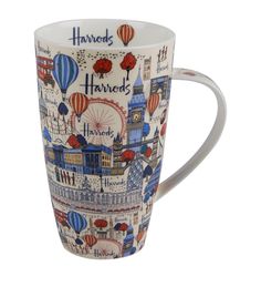 a coffee cup with an image of hot air balloons on it