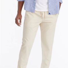 Introducing Our Newest Pants: An Upgraded, Modern Take On A Laid-Back Drawstring Style. The Tailored Fit Makes Them Casual Enough For Running Errands, But Sharp Enough To Wear To The Office (With The Right Untucked Shirt Of Course). They’re Made With A Supersoft Cotton-Linen Blend That’s Insanely Comfortable. All You Have To Do Is Make Room In Your Closet. Features Elastic Waistband With Drawstring Sku #41092tan Fabrics 75% Cotton, 25% Linen Imported Summer Stretch Tapered Leg Chinos, Casual Stretch Chinos For Summer, Summer Chinos With Elastic Waistband, Casual Tapered Leg Summer Chinos, Summer Tapered Leg Chinos With Elastic Waistband, Casual Beige Chinos For Summer, Beige Casual Chinos For Summer, Summer Relaxed Fit Chinos With Elastic Waistband, Beige Casual Bottoms For Business Casual