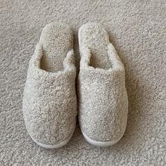 New Never Worn Slippers. Slippers Are Cream Colored Closed Toe In Faux Fur. Super Cute And Comfy! Casual Cream Slippers With Cushioned Footbed, White Casual Slippers With Soft Texture, Casual White Slippers With Soft Texture, Casual Slip-on Slippers With Soft Texture, Casual Beige Super Soft Slippers, Casual Cream Flat Slippers, Beige Casual Slippers For Loungewear, Casual Beige Slippers For Loungewear, Cream Color