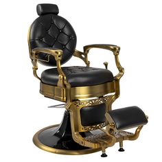 a black and gold barber chair sitting on top of a table