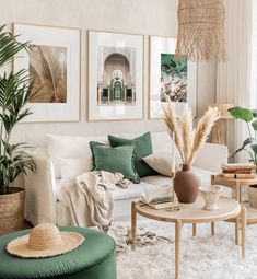 a living room filled with furniture and plants