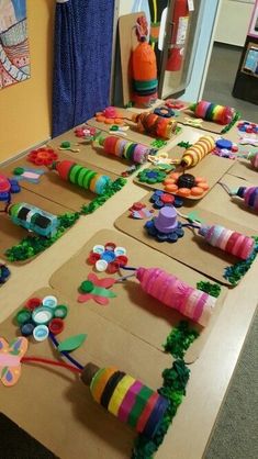 the table is covered with many colorful objects