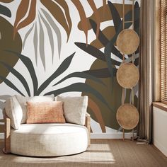 a living room scene with focus on the sofa and wallpaper that has palm leaves