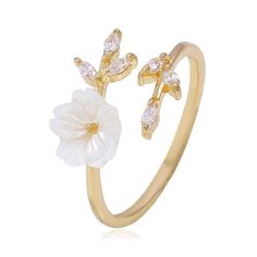 White flowers symbolize reverence and humility, purity and innocence or sympathy for a bereavement. Flaunt your whimsical charm in our Flower Branch Ring which shows off a sweet white flower motif and stunning CZ stones as "leaves". DETAILS & SIZE Composition: Gold, rose gold or silver plated over copper; 1-3mm CZ crystals, 8mm resin flower Measurements: circle: 12mm width; ring band: 14g, adjustable Read about how to care for your jewelry here. Shop Rings for more options to stack this with Cherry Blossom Ring, Gold Wrap Ring, Flower Engagement Ring, Gold Wrap, Knuckle Ring, Classy Jewelry, Wrap Rings, Flower Ring, Crystal Rings