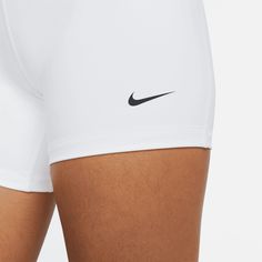 Style No. CZ9831-101 Color: White/Black The Nike Pro 365 Shorts wrap you in stretchy fabric with Dri-FIT technology to keep you feeling supported and dry during intense workouts. Tight fit for a body-hugging feel. 5-inch Inseam. 83% polyester/17% spandex. Nike Pro 365 Women's 5" Shorts. Red Nike Pros, White Nike Pros, Red Puffer, Red Nike, Intense Workout, Nike Pros, Nike Outfits, Dri Fit, White Shorts