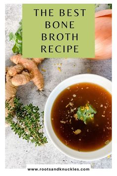 the best bone broth recipe with ginger, garlic and parsley in a white bowl