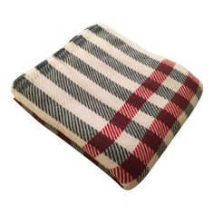 a red and black checkered blanket on a white background