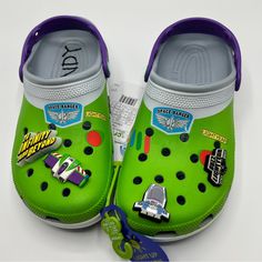 New With Tags Crocs X Toy Story Collab! Buzz Lightyear Design With Matching Croc Charms! Mens Size 9 Womens Size 11 Questions? Leave A Comment Below! Croc Charms, Buzz Lightyear, Crocs Shoes, Toy Story, Green Yellow, Clogs, Men's Shoes, Limited Edition, Slippers