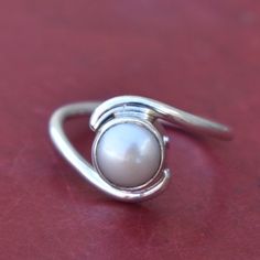 Beautiful Pearl Ring,Cultured South Sea Pearl Ring,Solid 925 Sterling Silver White Gemstone Ring,Handmade Jewelry,Promise Ring,Gift for her Gemstone : Pearl Stone Shape : Round Stone Color : White Stone Dimension (Approx) : 7 x 7 mm Ring Sizes : All Size Rings Available If you want to set the stones in 925 Solid Sterling Silver Like as earrings, pendant , Ring. I am always ready to make your custom design jewelry. Please contact me. --------------------------------------------------------------- Elegant Adjustable Moonstone Ring With Round Stone, Elegant Silver Toe Ring Birthstone, Elegant Silver Stackable Birthstone Ring, Silver Elegant Stackable Birthstone Ring, Silver Stackable Elegant Birthstone Ring, Elegant Adjustable Open Moonstone Ring, Elegant Adjustable Moonstone Ring, Elegant Stackable Moonstone Ring In Sterling Silver, Elegant Stackable Sterling Silver Moonstone Ring