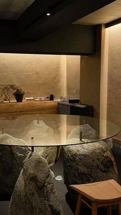 a glass table with some rocks on it