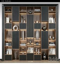 an open bookcase with many different items on the shelves and below it is a white vase